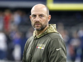 FILE - In this Nov. 5, 2017, file photo, Kansas City Chiefs offensive coordinator Matt Nagy stands on the field during warm ups before an NFL football game against the Dallas Cowboys, in Arlington, Texas. Chicago Bears general manager Ryan Pace announced the hiring of Matt Nagy as the NFL football team's 16th head coach, Monday, Jan. 8, 2018.