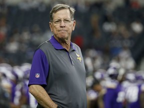 FILE - In this Aug. 29, 2015, file photo, then-Minnesota Vikings offensive coordinator Norv Turner watches the team warm up before a preseason NFL football game against the Dallas Cowboys, in Arlington, Texas. A person familiar with the situation says the Carolina Panthers are interviewing Norv Turner for their vacant offensive coordinator position. The person spoke to The Associated Press Thursday, Jan. 11, 2018, on condition of anonymity because the team does not discuss potential coaching candidates. The Panthers fired offensive coordinator Mike Shula and quarterbacks coach Ken Dorsey Tuesday, two days after a playoff loss to the Saints.