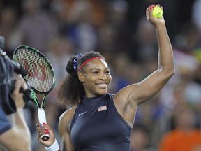 FILE - In this Aug. 8, 2016, file photo, Serena Williams, of the United States, prepares to hit an autographed ball into the crowd after defeating France's Alize Cornet in the women's tennis competition at the 2016 Summer Olympics in Rio de Janeiro, Brazil. Williams is returning to tournament play for the first time since the birth of her first child. Williams was among the entries released Wednesday, Jan. 24, 2018, for the BNP Paribas Open, which runs March 5-18, in Indian Wells, Calif.