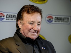 FILE - In this Jan. 21, 2016, file photo, team owner Richard Childress talks to members to the press during the NASCAR Charlotte Motor Speedway Media Tour in Charlotte, N.C. Authorities say three men have been arrested for breaking into the home of NASCAR team owner Richard Childress. The Davidson County Sheriff's Office said it learned from police in Winston-Salem that the guns used at the Childress home matched firearms that were reported stolen during a break-in on Dec. 15. The three men arrested for the break-in at the Childress home matched the description of the suspects in the gun theft.