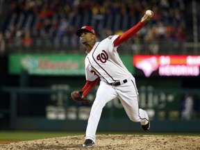 FILE - In this June 2, 2015, file photo, Washington Nationals relief pitcher Felipe Rivero (73) throws during the second baseball game of a doubleheader against the Toronto Blue Jays at Nationals Park, in Washington.The hard-throwing left-handed reliever finalized a $22 million, four-year contract with the pPittsburgh Pirates on Thursday, Jan. 18, 2018, a deal that includes two club options and could be worth $41 million over six seasons.