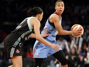In this Wednesday, June 7, 2017 photo, Atlanta Dream guard Layshia Clarendon (23) looks to pass during an WNBA basketball game against the New York Liberty in New York. Former California women's basketball player and current WNBA guard Layshia Clarendon has filed a lawsuit against Cal claiming she was sexually assaulted by a longtime member of the athletic department. The school acknowledged the lawsuit Wednesday night, Jan. 17, 2018 and said the staff member, Mohamed Muqtar, had recently been placed on paid leave.