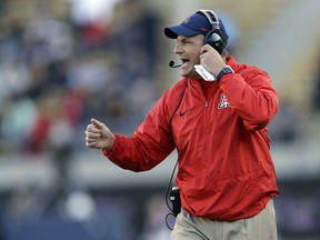 FILE - In this Oct. 21, 2017, file photo, Arizona coach Rich Rodriguez yells from the sideline during the first half of the team's NCAA college football game against California in Berkeley, Calif. Arizona has fired Rodriguez after a notice of claim was filed with the state attorney general's office alleging he ran a hostile workplace. The Arizona Daily Star revealed the notice of claim on Tuesday, Jan. 2, 2018, after making a public-records request. Athletic director Dave Heeke issued a statement saying the athletics department decided to go in a new direction after evaluating the program.