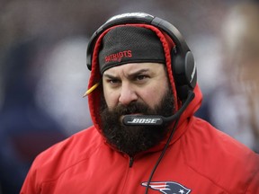 FILE - In this Dec. 31, 2017, file photo, New England Patriots defensive coordinator Matt Patricia watches from the sideline during the first half of an NFL football game against the New York Jets, in Foxborough, Mass. The New York Giants have interviewed New England Patriots defensive coordinator Matt Patricia for their vacant head coaching job. Patricia met with new general manager Dave Gettleman, Giants co-owner John Mara and assistant general manager Kevin Abrams on Friday, Jan. 5, 2018,  in Foxborough, Mass.