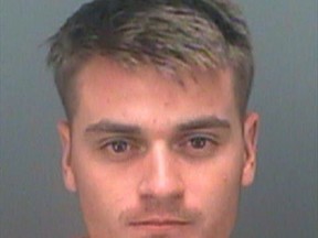 FILE - This undated file booking photo provided by Pinellas County Sheriff's Office shows Brandon Russell. Handwritten letters show Russell, a neo-Nazi group leader, hasn't abandoned his "violent ideology" since his arrest on charges he stockpiled volatile explosive material in a Florida apartment where a friend killed their two roommates, federal prosecutors told the judge who will sentence the young man on Tuesday, Jan. 9, 2018. (Pinellas County Sheriff's Office via AP, File)