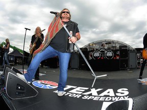 FILE - In this April 9, 2016, file photo, Johnny Van Zant fronts the band Lynyrd Skynyrd during a convert before the NASCAR Sprint Cup Series auto race at Texas Motor Speedway in Fort Worth, Texas. Southern rock icons Lynyrd Skynyrd will kick off their final tour May 4, 2018, in West Palm Beach, Fla., more than 40 years after the band's debut album was released.