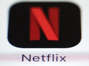 This Monday, July 17, 2017, photo shows a Netflix logo on an iPhone in Philadelphia. Netflix Inc. reports earnings, Monday, Jan. 22, 2018.