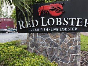 FILE - This Tuesday, Sept. 13, 2016, file photo, shows a Red Lobster restaurant in North Miami, Fla. Red Lobster CEO Kim Lopdrup says the company has updated its kitchens and plans to grow its worldwide restaurant count from 750 to 1,000 in the next decade.