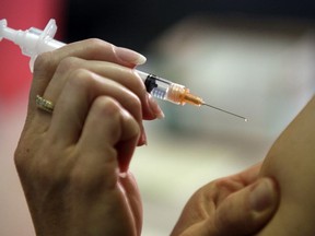 FILE - In this Wednesday, Nov. 4, 2009, file photo, a nurse administers an injection at a Pennsylvania hospital. In an initiative announced Thursday, Jan. 18, 2018, several major not-for-profit hospital groups are trying their own solution to drug shortages and high drug prices: creating a company to make cheaper generic drugs.