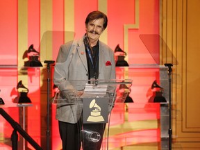 FILE - In this Jan. 25, 2014, file photo, Rick Hall attends The 56th Annual GRAMMY Awards - Special Merit Awards Ceremony in Los Angeles. Hall, an Alabama record producer who recorded some of the biggest musical acts of the 1960s and `70s and helped develop the fabled "Muscle Shoals sound," died Tuesday, Jan. 2, 2018, following a fight with cancer, his longtime friend Judy Hood said. He was 85.