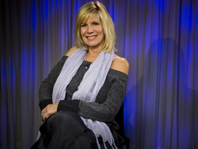 FILE - In this Friday, Dec. 8, 2017, photo singer Debby Boone poses for a photo at the AP television studios in Los Angeles. Debby Boone, best known for her 1977 song "You Light Up My Life," is celebrating its 40 years with a reissued CD. Boone won a Grammy for best new artist in 1978.