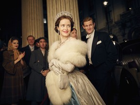 This image released by Netflix shows Claire Foy, center, and Matt Smith, right, in a scene from "The Crown." The New York Times website recaps each episode of "The Crown" in text stories, but it goes the extra mile. Through the miracle of hyperlinks and its own "Times Machine" function, the site links wanderers to the paper's original reporting _ and its original pages in PDFs detailing numerous actual events covered in the series.