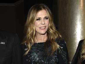 FILE - In this Jan. 7, 2018 file photo, actress and singer Rita Wilson attends the 75th annual Golden Globe Awards in Beverly Hills, Calif. Performing rights organization BMI said Tuesday, Jan. 9, that Wilson, singer-songwriter Craig Wedren and pop singer Morgan Saint will perform at its 16th annual Snowball on Jan. 23 at The Shop at Park City, Utah.