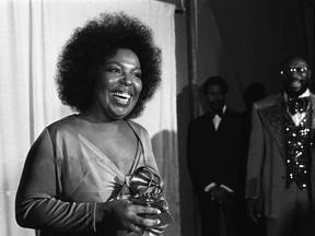 FILE - In this March 4, 1974 file photo, Roberta Flack holds the Grammy award for record of the year for "Killing Me Softly With His Song" at the 16th annual Grammy Awards in Los Angeles. Flack, one of only two artists who have won the category two years in a row, won in 1973 for "The First Time Ever I Saw Your Face." (AP Photo, File)