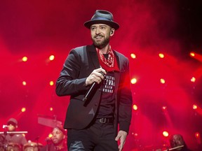FILE - In this Sept. 23, 2017 file photo, Justin Timberlake performs at the Pilgrimage Music and Cultural Festival in Franklin, Tenn. Timberlake previewed his new album "Man of the Woods" Tuesday, Jan. 16, 2018, at a venue that was decorated with bushes and trees, and served ants coated in black garlic and rose oil and grasshoppers, showcasing the album's theme. Timberlake, who will headline next month's Super Bowl halftime show, worked again with his mega-producer Timbaland on the album. First single and album opener, "Filthy," debuted at No. 9 on the Billboard Hot 100 chart this week.