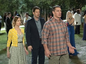 This image released by Universal Pictures shows Leslie Mann, from left, Ike Barinholtz and John Cena in a scene from "Blockers," a film premiering at the 25th South by Southwest Film Festival. SXSW's film festival will run March 9-18.