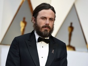 FILE - In this Feb. 26, 2017 file photo, Casey Affleck arrives at the Oscars in Los Angeles. Affleck, who won the best actor award for his role in "Manchester By the Sea," will not be presenting at the 90th Academy Awards. Affleck's publicist confirmed Thursday that the actor is not attending the ceremony on March 4. Traditionally, the reigning best actor winner returns to present the best actress award.
