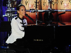FILE - In this Feb. 11, 2012 file photo, Alicia Keys performs at the Clive Davis pre-Grammy gala in Beverly Hills, Calif. Davis' gala, held a day before the 2018 Grammy Awards, launched the careers of Whitney Houston and Alicia Keys, and have featured all-stars like Aretha Franklin, Carole King, Smokey Robinson and Carly Simon. He first held the gala 42 years ago.