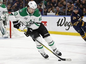 Dallas Stars forward Remi Elie (40) controls the puck during the first period of an NHL hockey game against the Buffalo Sabres, Saturday, Jan. 20, 2018, in Buffalo, N.Y.