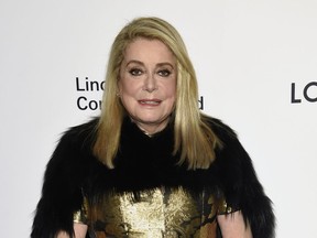 FILE- In this Nov. 30, 2017, file photo, Catherine Deneuve attends the Lincoln Center Corporate Fund Gala honoring Louis Vuitton artistic director of women's collections Nicolas Ghesquiere, at Alice Tully Hall in New York. Deneuve was among about 100 performers, scholars and others who signed an open letter published Tuesday, Jan. 9, 2018, by the newspaper Le Monde saying the "legitimate protest against sexual violence" stemming from the Harvey Weinstein scandal has gone too far and threatens hard-won sexual freedoms.