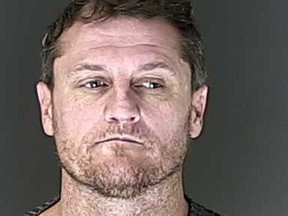 This undated photo provided by the El Paso County, Colorado sheriff's office shows Terry Allen Miles. A suburban Austin police chief says Miles, a person of interest in the death of a woman and abduction of her two daughters, has been caught in Colorado without incident. (El Paso County, Colorado sheriff's office via AP)