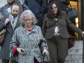 Linda Lacewell, right, chief of staff to New York Gov. Andrew Cuomo, leaves a Manhattan Federal courthouse, Wednesday, Jan. 24, 2018, in New York. Lacewell testified Wednesday at Joseph Percoco's bribery trial. Opening statements were Tuesday at the trial of Percoco and three businessmen accused of paying him over $300,000 in bribes to help them get what they needed from the state.