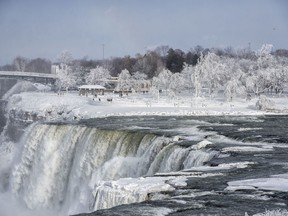 A frozen Niagara Falls is seen in views from Stedman's Bluff on Goat Island of the American Falls and Prospect Point beyond. Almost every year frigid temperatures transform Niagara Falls State Park into an icy winter wonderland when the mist of the falls is blown back, freezing on the landscape.