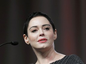 FILE- In this Oct. 27, 2017, file photo, actress Rose McGowan speaks at the inaugural Women's Convention in Detroit. Actress and activist McGowan will be the subject of a new documentary TV series. E! said Tuesday, Jan. 2, 2017,  it will air the first part of "Citizen Rose" on Jan. 30, which coincides with the release of her memoir, "Brave."