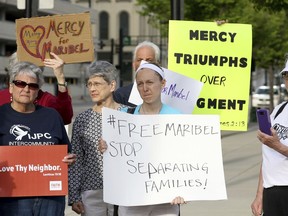 FILE - In this April 10, 2017, file photo, Nuns on the Bus, The Intercommunity Justice and Peace Center (IJPC) and other community members protest in Cincinnati against the deportation of Maribel Trujillo Diaz in Cincinnati. A federal appeals court is ordering U.S. immigration authorities to reconsider the case of Diaz, a Mexican mother of four U.S.-born children, who was deported last year while claiming she faced targeting by a Mexican drug cartel. A three-judge panel of the Cincinnati-based 6th U.S. Circuit Court of Appeals ruled Wednesday, Jan. 17, 2018, in favor of Diaz.