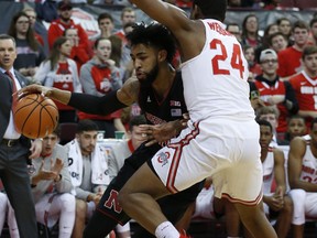 Nebraska's Isaac Copeland, left, drives the baseline against Ohio State's Andre Wesson during the first half of an NCAA college basketball game Monday, Jan. 22, 2018, in Columbus, Ohio.