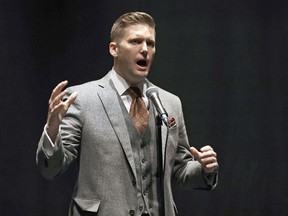 FILE – In this Oct. 19, 2017, file photo, white nationalist Richard Spencer speaks at the University of Florida in Gainesville, Fla. A Kent State University spokesman confirmed Thursday, Jan. 18, 2018, that Spencer's campus tour organizer is making a bid for him to speak at the Ohio school on May 4, 2018, the anniversary of shootings that killed four students during a Vietnam war protest in 1970.