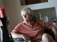 This May 20, 2014 file photo shows Fred Goldman, father of victim Ron Goldman, in his home in Peoria, Ariz. A lawyer for the family of Fred Goldman says O.J. Simpson is profiting from autographs since his release from prison and should pay the money toward a wrongful death judgment exceeding $70 million.