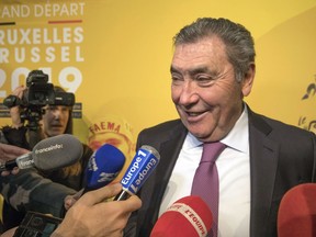 Former cyclist Eddy Merckx speaks during a presentation of the 2019 Tour de France cycling race in Brussels on Tuesday, Jan. 16, 2018. The start of the 2019 Tour de France will be all about honoring Merckx in his hometown Brussels. Merckx _ known as The Cannibal for his ferocious taste for victory _ won his first of five Tours in 1969 and half a century later still sees it as one of the major accomplishments of a cyclists generally seen as the greatest ever.