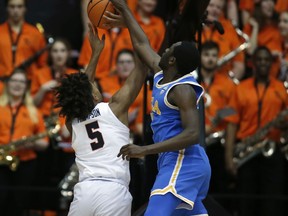 Oregon State's Ethan Thompson (5) has his shot blocked by UCLA's Prince Ali during the first half of an NCAA college basketball game in Corvallis, Ore., Thursday, Jan. 18, 2018.