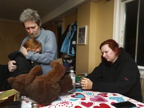 Peter Mellon, daughter Vicky and wife Tracy grieve the death of son Nick Hickey, who was run over and killed by a car in Bells Corners.