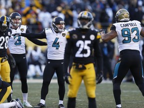 Jacksonville Jaguars kicker Josh Lambo (4) celebrates after kicking a field goal during the second half of an NFL divisional football AFC playoff game against the Pittsburgh Steelers in Pittsburgh, Sunday, Jan. 14, 2018.