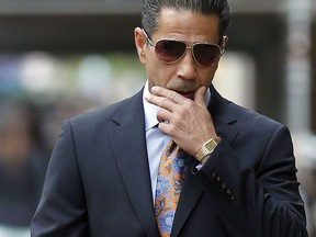 FILE - In this Oct. 10, 2014 file photo, Joseph "Skinny Joey" Merlino arrives at federal court in Philadelphia. The reputed Philadelphia mob boss known for beating murder raps and reinventing himself as a restaurateur is facing fraud charges in a federal trial in New York City. Opening statements are set for Tuesday, Jan. 30, 2018 in Manhattan.