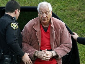 FILE - In this Oct. 29, 2015, file photo, former Penn State University assistant football coach Jerry Sandusky arrives for an appeal hearing at the Centre County Courthouse in Bellefonte, Pa. Penn State has settled a lawsuit that alleged Sandusky molested the plaintiff in 2007 when he was about 14 years old, according to a settlement notice posted Monday, Jan. 8, 2018, on the Philadelphia courts website and confirmed by a lawyer for the plaintiff, called John Doe in case documents. The lawsuit had been scheduled for trial in late February.