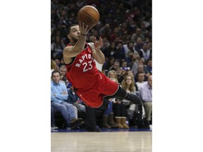 Toronto Raptors guard Fred VanVleet (23) attempts an off balance shot against the Philadelphia 76ers during the second quarter of an NBA basketball game in Philadelphia, Monday, Jan. 15, 2018.