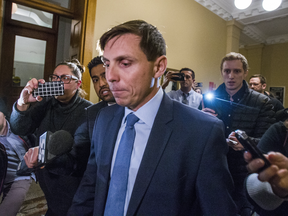 Patrick Brown is followed by reporters after addressing allegations against him at Queen's Park in Toronto on Wednesday.