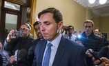 Patrick Brown is followed by reporters after addressing allegations against him on Jan. 24, 2018.