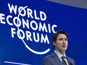 Prime Minister Justin Trudeau addresses the World Economic Forum Tuesday, January 23, 2018 in Davos, Switzerland. Trudeau says Canada and 10 other countries of the Trans-Pacific Partnership have agreed to a revised trade agreement.