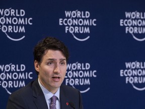 Prime Minister Justin Trudeau responds to a question during the closing news conference at the World Economic Forum Thursday, January 25, 2018 in Davos, Switzerland. Trudeau is saluting the courage of women who've levied allegations of sexual misconduct against the former leader of the Ontario Progressive Conservative party.