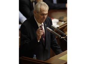FILE- In this file picture taken on Wednesday, Jan. 10, 2018, Czech Republic's President Milos Zeman, makes a speech during a Parliament session in Prague, Czech Republic. The Czech Republic holds a first round of presidential elections on Jan. 12-13th, 2018.