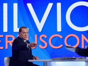 Former Premier Silvio Berlusconi attends 'L'aria che tira' tv show at La 7 studios, in Rome, Thursday, Jan. 18, 2018. Berlusconi can't run for office because of a tax fraud conviction, but three-time former Premier is once playing king-maker on the Italian political scene ahead of the upcoming March 4 general election.