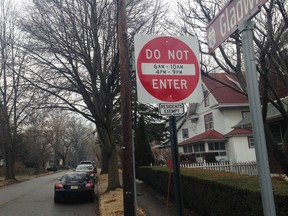 A do not enter street sign stands in Leonia, N.J., on Monday, Jan. 22, 2018, where local officials are trying to reduce traffic congestion on their way to the nearby George Washington Bridge into New York. As a response to navigation apps that re-route some of the tens of thousands of vehicles headed to the bridge, Leonia is to start imposing fines Monday on non-residents who drive on residential streets during the morning and evening commutes.