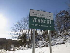 This Friday, Jan. 26, 2018, photo shows a road sign welcoming drivers to Vermont in Wells River, Vt., on the New Hampshire border. Vermont officials are hoping a new program that would use cutting-edge, targeted marketing and a host of incentives, both economic and emotional, can attract new people to live in the Green Mountain State, helping to alleviate what is fast becoming a chronic labor shortage caused by a stagnant, aging population.