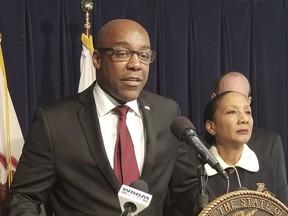 FILE - In this Nov. 30, 2017 file photo, Illinois state Sen. Kwame Raoul speaks during a news conference in Chicago. Members of the Haitian-American community are criticizing President Donald Trump for using bluntly vulgar language as he questioned why the U.S. would accept more immigrants from Haiti and Africa rather than places like Norway. The comments angered Raoul, whose Haitian parents immigrated to the U.S. in the 1950s. The Chicago Democrat said, "I don't think there's any apologizing out of this."