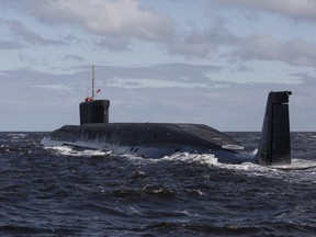 FILE - in this file photo taken on Thursday, July 2, 2009 file photo a new Russian nuclear submarine, Yuri Dolgoruky, is seen during sea trials near Arkhangelsk, Russia.