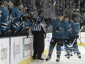 San Jose Sharks right wing Timo Meier, front right, from Switzerland, celebrates with teammates after scoring a goal against the Pittsburgh Penguins during the first period of an NHL hockey game in San Jose, Calif., Saturday, Jan. 20, 2018.